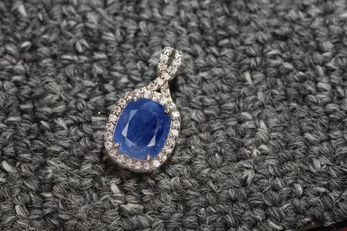Elegant Blue Sapphire Pendant in 925 Silver At Navratan